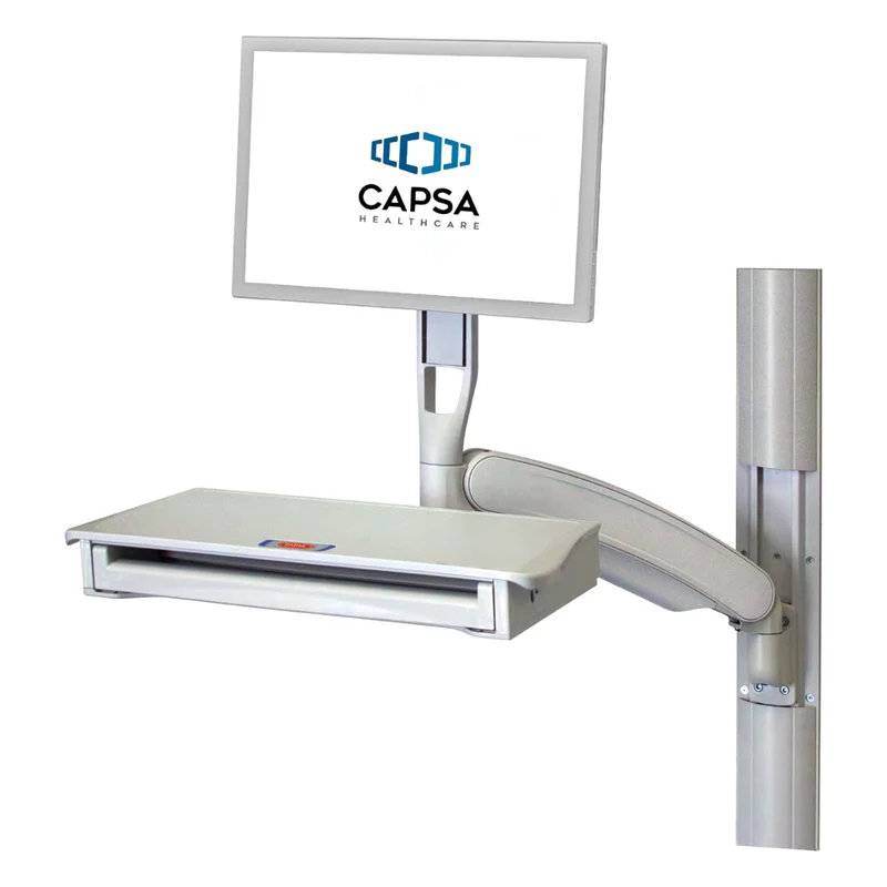 Capsa Fluid ULT wall arm with a monitor and a work surface on a wall track