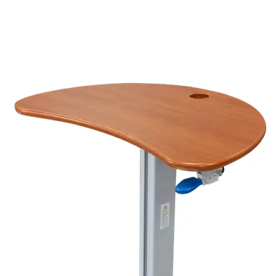 Kidney-shaped work surface in a wood finish with its cable routing hole