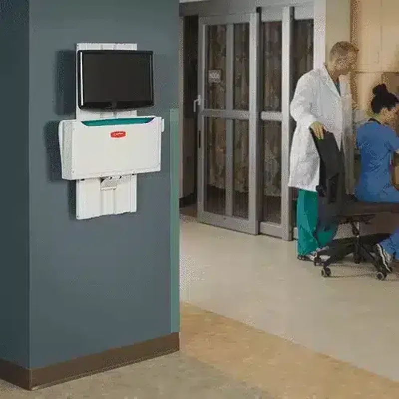 Slim Line wall arm mounted on a wall in a hospital corridor